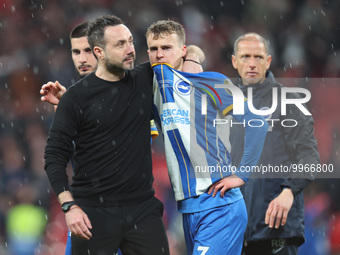 Brighton & Hove Albion manager Roberto De Zerbi console Brighton & Hove Albion's Solly March breaks down in tears after missing crucial pena...