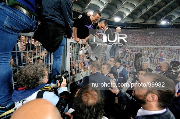 Supporters and Police prior to the Italy Cup final soccer match between ACF Fiorentina and SSC Napoli at the Olimpico stadium in Rome, Italy...