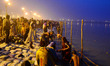 Indian Hindu devotees take a holy dip for the Makar Sankranti festival during the annual "...