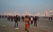 An Indian sadhu (holy man) walks to take a holy dip for the Makar Sankranti festival durin...